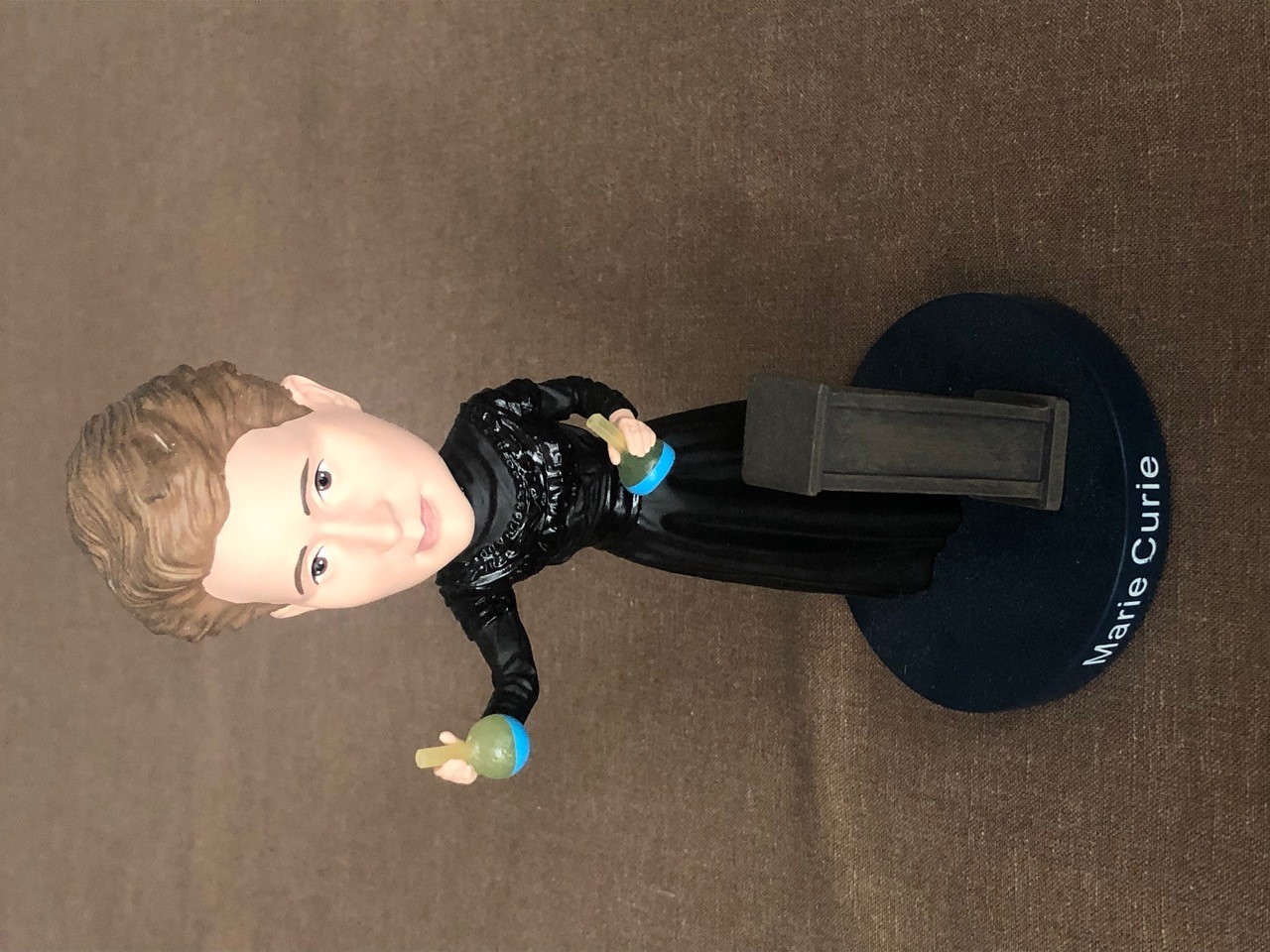 A bobblehead of Marie Curie